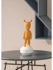 The Orange Guest Figurine